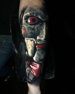 Tattoo Anansi München Artist Mark realisim saw puppet dark