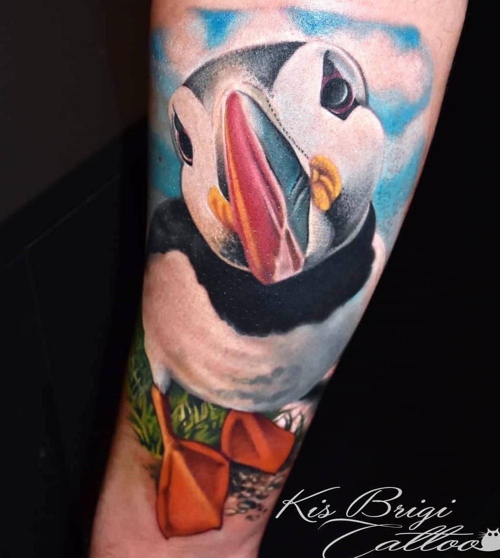Tattoo Anansi München Artist Brigi realism portrait color animal seabird